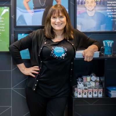 Cindy Hovig at Xero booth at a conference